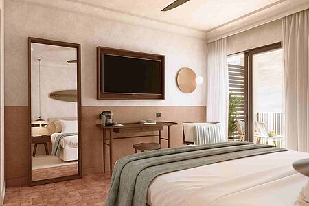 Sapphire Cozy Suite 40-46 qm  Ein Schlafzimmer mit Doppelbett bietet ein Höchstmaß an Komfort und Privatsphäre mit herrlichem Meerblick. Erdige Farbtöne treffen auf eine moderne Ästhetik, die jeden denkwürdigen Moment elegant umarmt. Freuen Sie sich auf geräumige Innenräume mit unvergleichlichem Design und die Annehmlichkeiten von Cool Living.