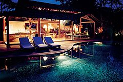 Pool at night Uxua Casa Hotel