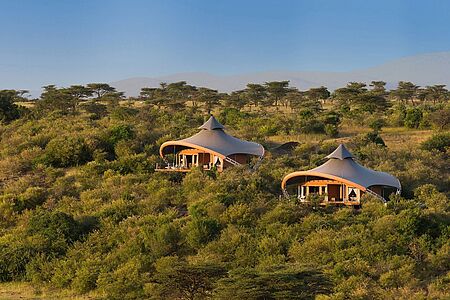 Mahali Mzuri Das Camp Mahali Mzuri im Motorogi Gebiet in Kenia empfängt Sie an einem üppigen Tal mit atemberaubender Aussicht über die weite Prärie und die unberührte Natur. Von Sir Richard Branson gegründet, gehört das exklusive Camp zur „Virgin Limited Edition“ und verspricht höchsten Komfort sowie erstklassigen Service bei einer dennoch relaxten und unkomplizierten Atmosphäre.
