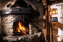 Österreich Alpbach Luxus-Chalet Bischofer Alm Kamin