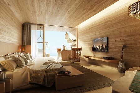 Cave Royale Diese ultimative Cave Suite mit übergroßem Bett, großzügigen Badezimmer, Flügel, Innen- und Außenwohnbereich, kompletter Bar und Außenwanne. Diese Suite ist eine Hommage an Ibiza.