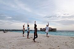 Yoga on the Beach Soneva Fushi